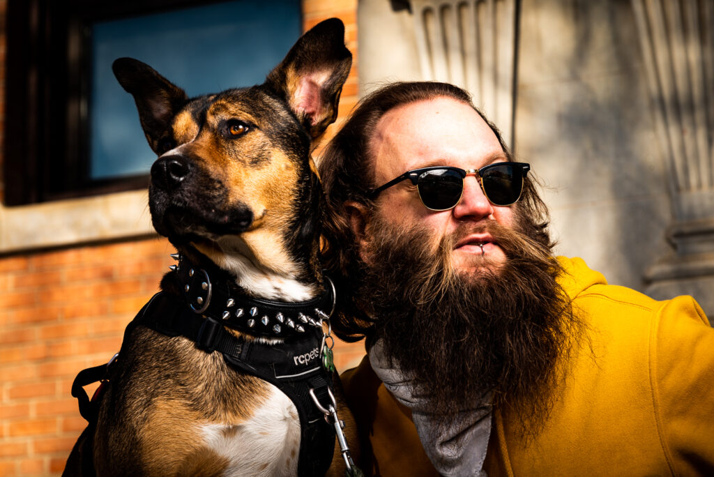 Photo of Jason and his dog.